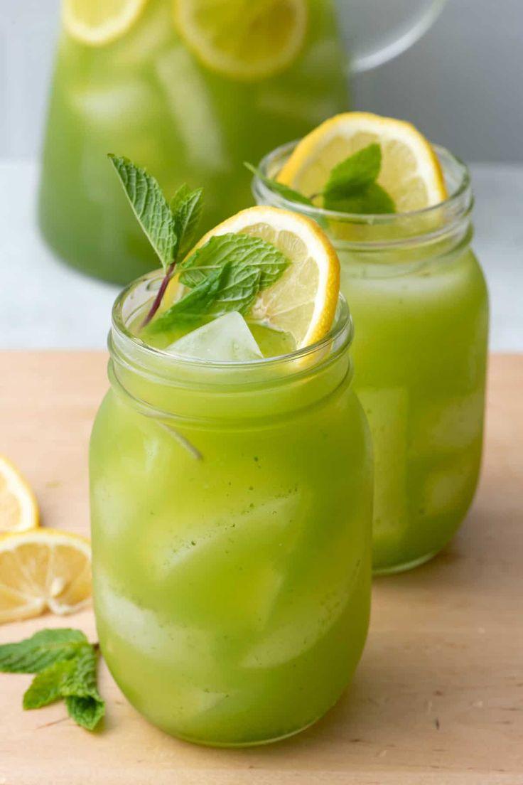 Two mason jars with lemonade and mint