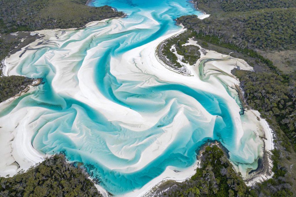 Aerial view of Hill Inlet's swirling white sands and turquoise tidal channels